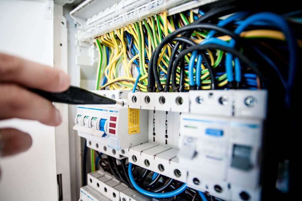 Electrician testing fuse board wiring in Great Yarmouth